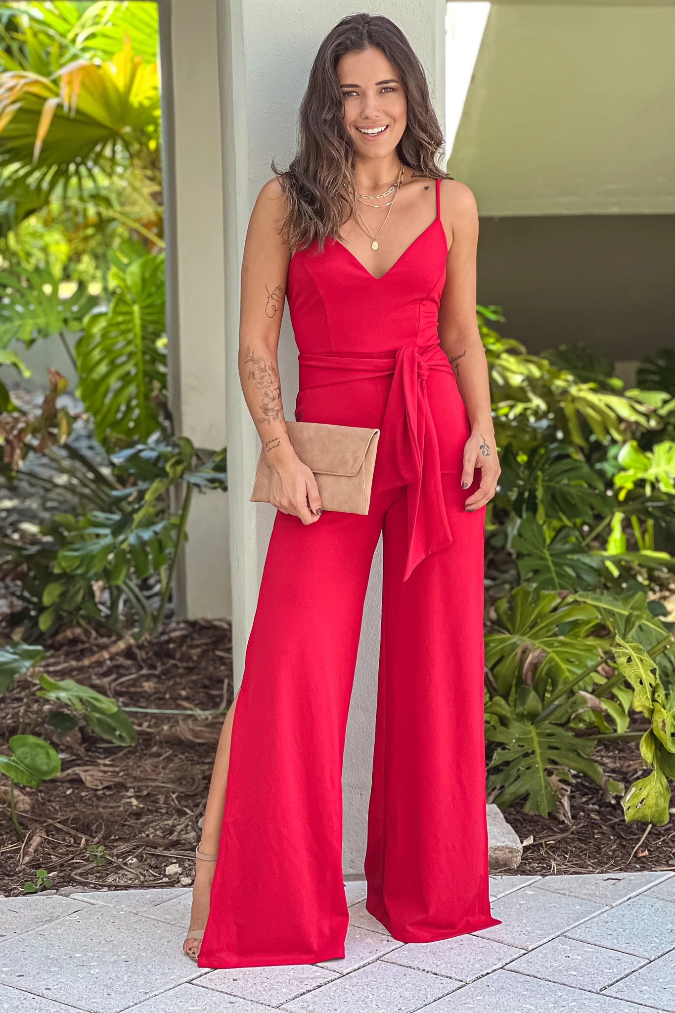 Red Jumpsuit With Side Slits And Criss Cross Back
