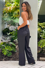White And Black Draped Neckline Jumpsuit With Pockets