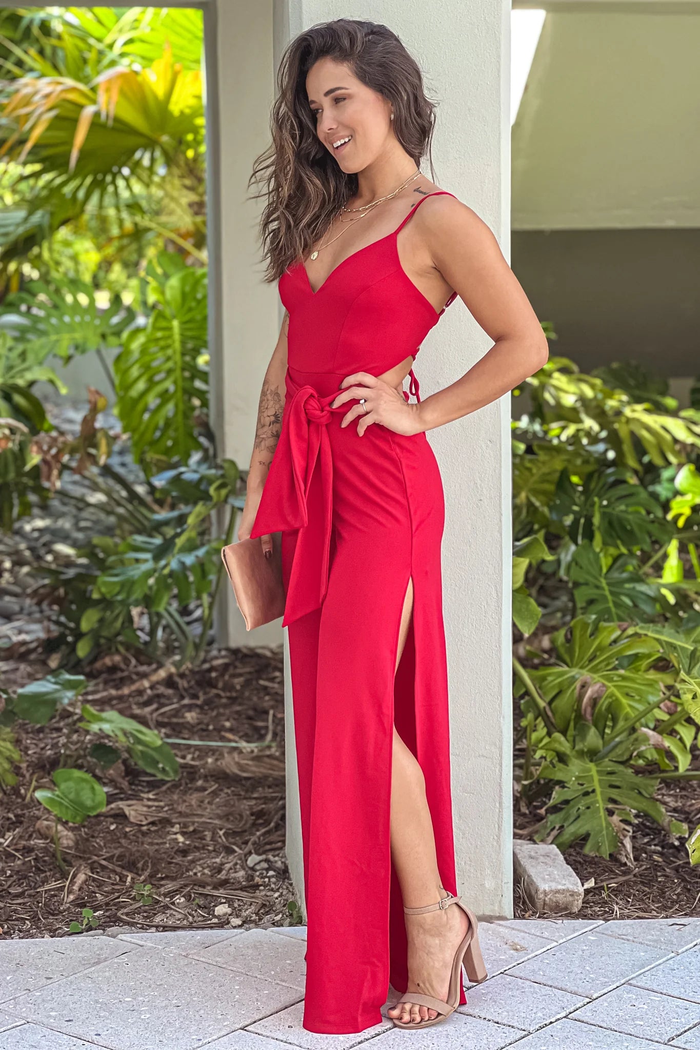 Red Jumpsuit With Side Slits And Criss Cross Back