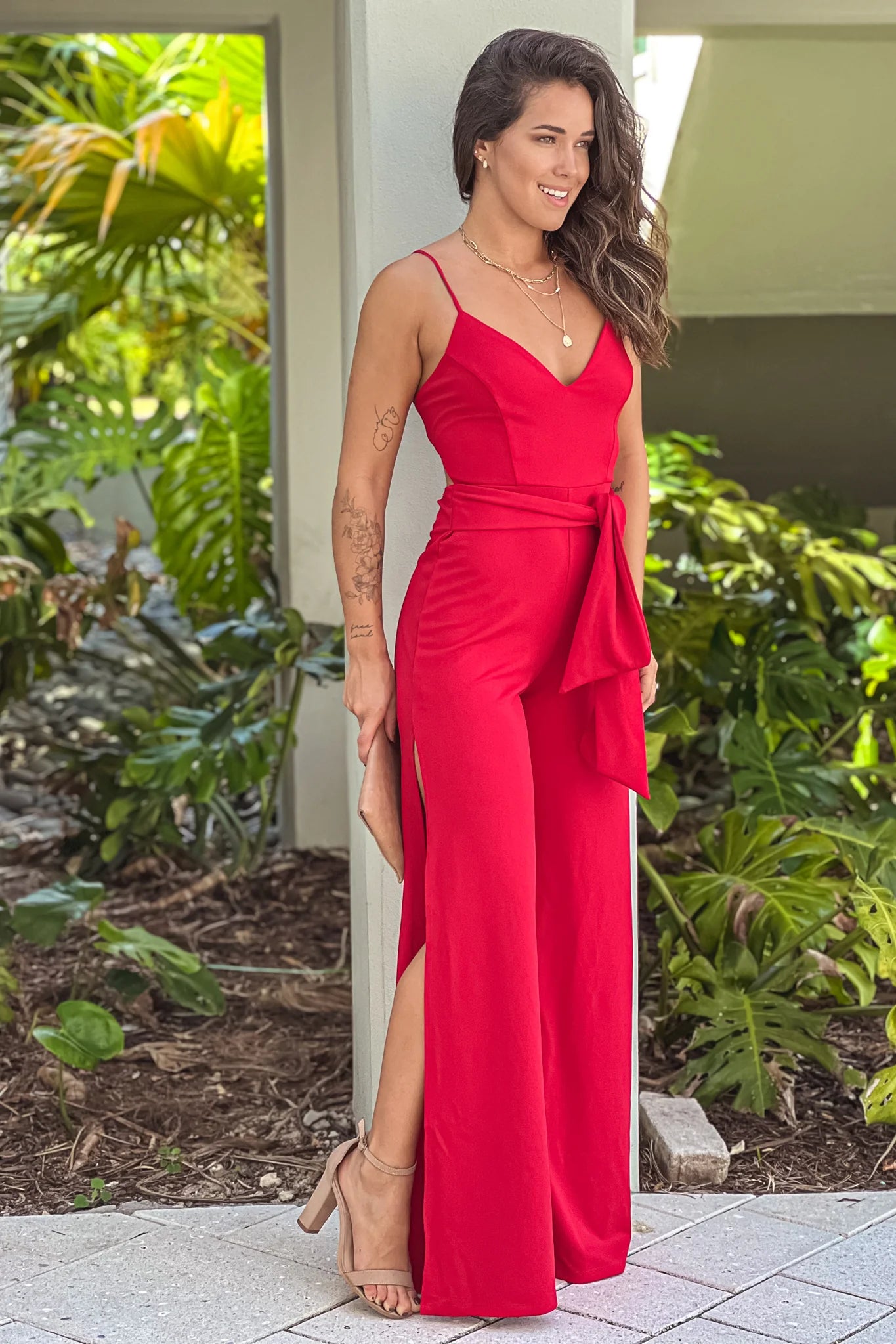 Red Jumpsuit With Side Slits And Criss Cross Back