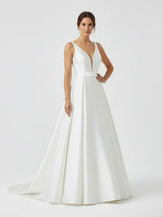 Ivory A Line Deep V Neck Long Wedding Dress with Bowknot